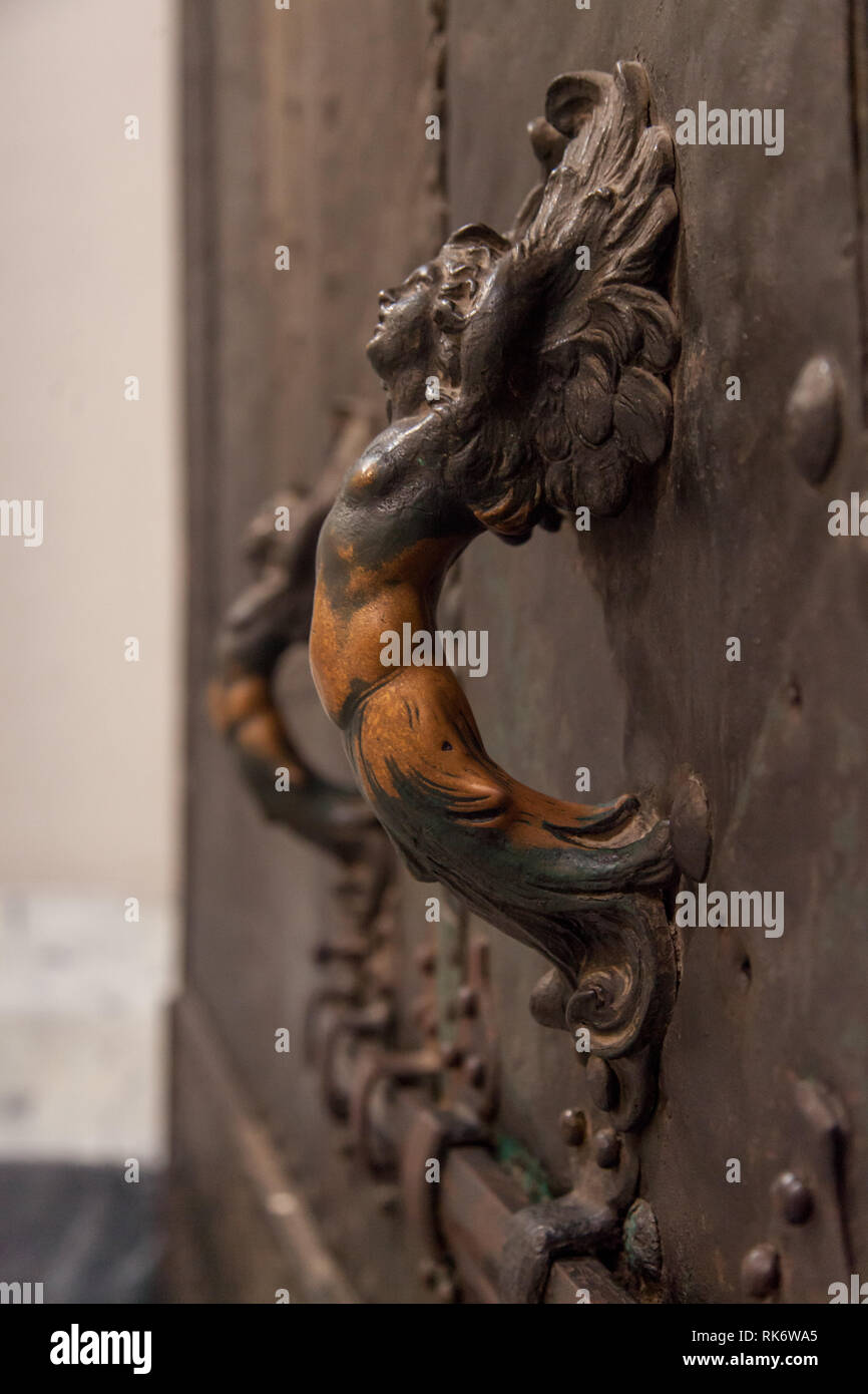 Old hadles and lock on the door of the Sint Pieter Basilica in Rome Stock Photo