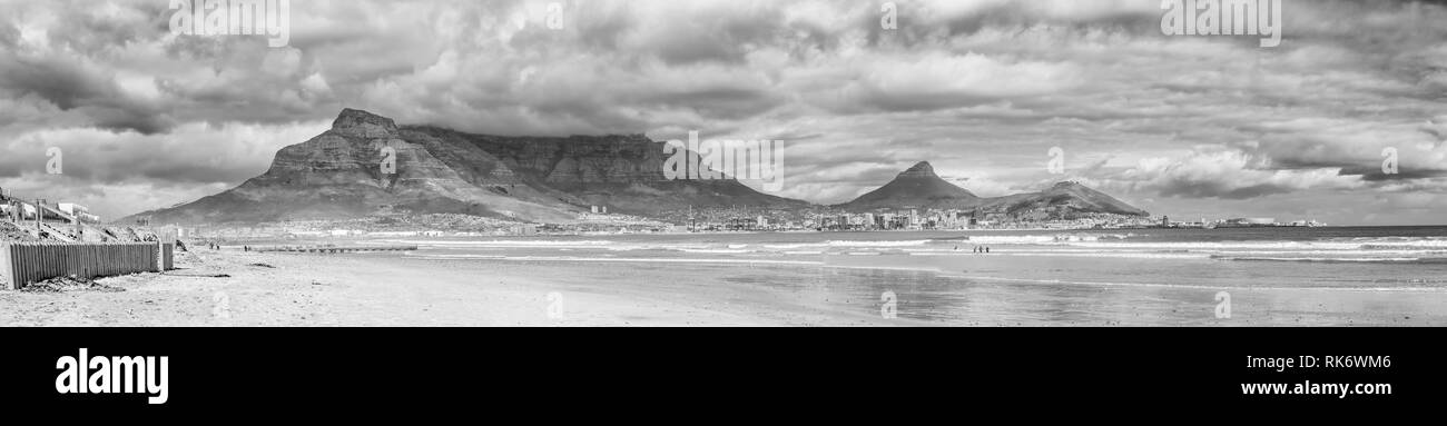 CAPE TOWN, SOUTH AFRICA, AUGUST 14, 2018: A view of Cape Town as seen from Lagoon Beach. The Central Business District, harbor, Devils Peak, Table Mou Stock Photo
