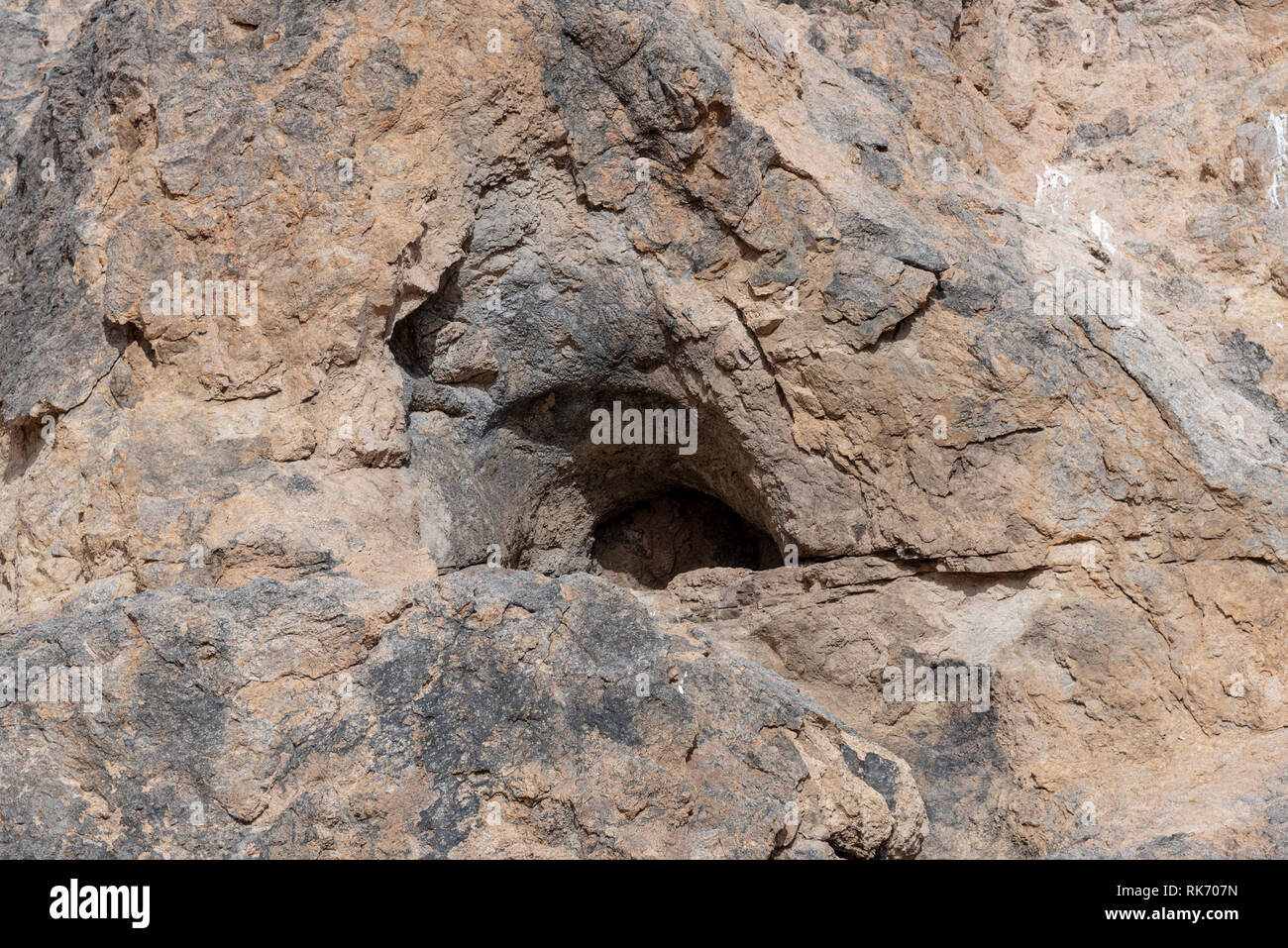 [Image: rocky-mountainside-with-small-cave-RK707N.jpg]