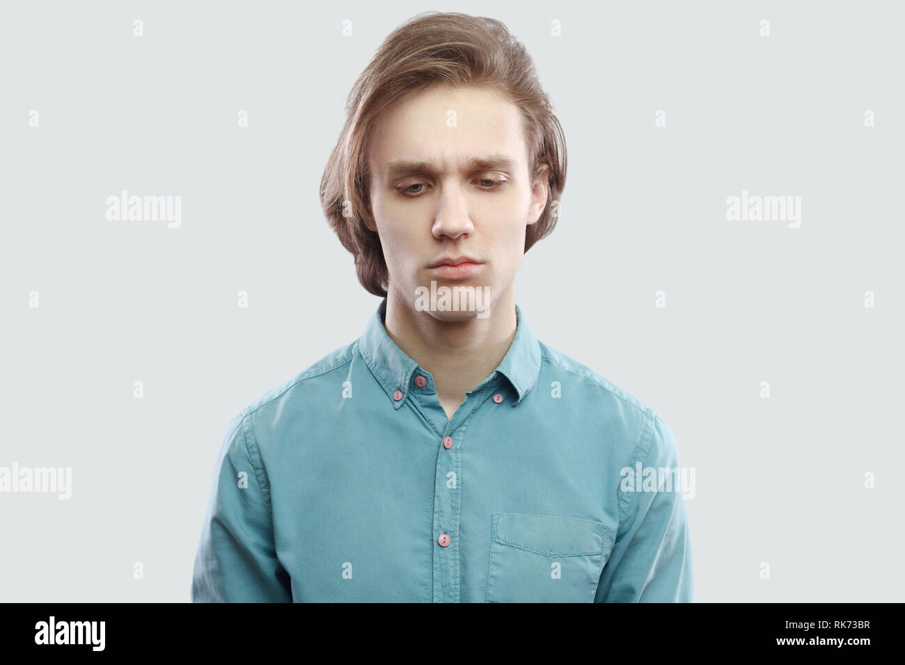 Sad long haired man in hi-res stock photography and images - Alamy