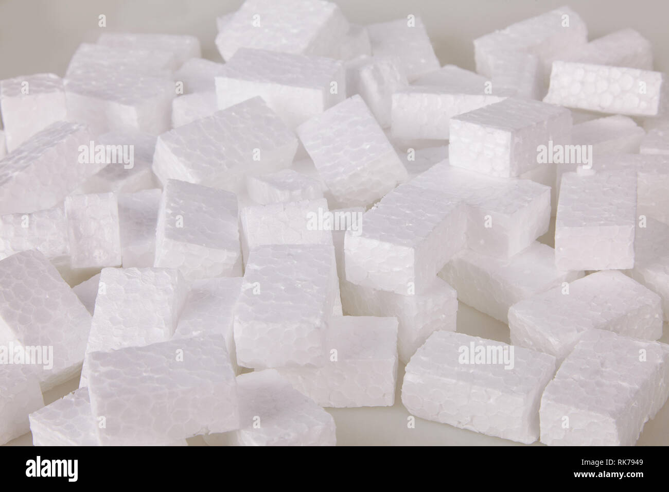 Filler packing background. Packaging foam pellets texture, top view