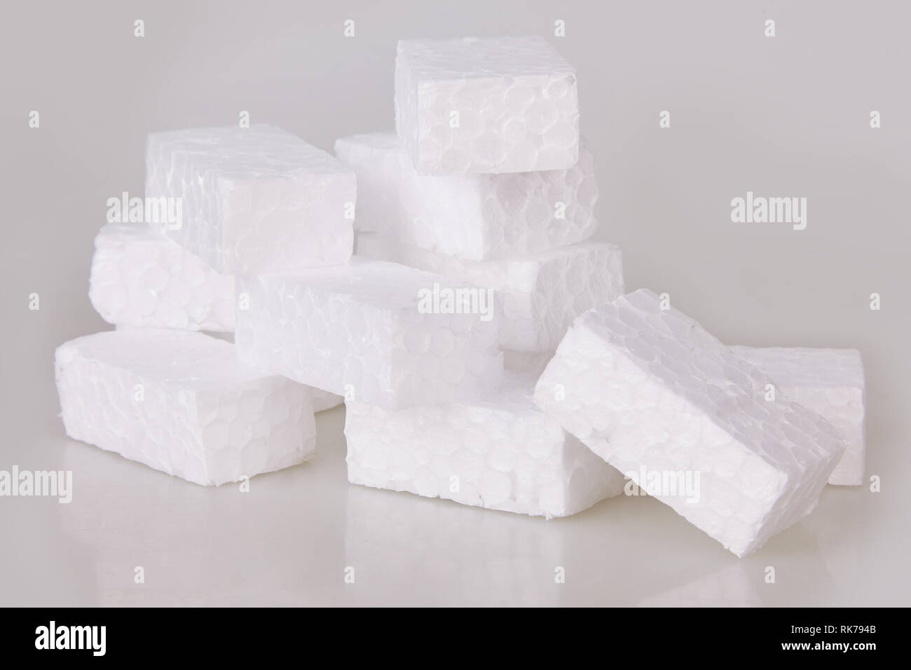 Filler packing background. Packaging foam pellets texture, top view