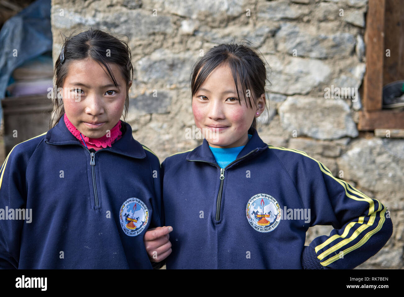 Young schoolgirls in the village of Laya, Gasa District, Snowman Trek, Bhutan Stock Photo