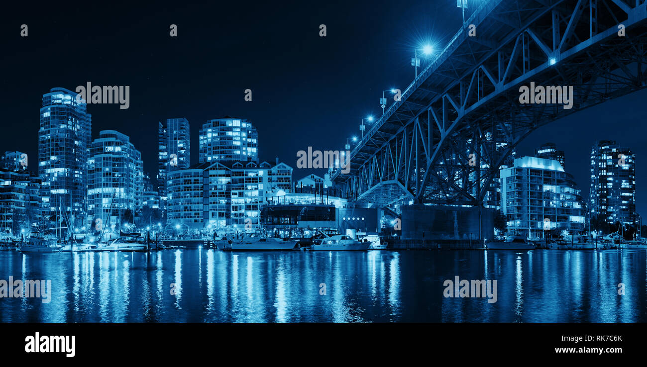 Vancouver False Creek at night with bridge and boat panorama Stock ...