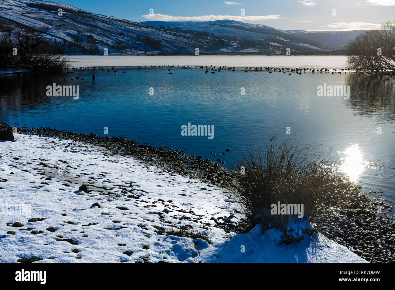 Semerwater in Winter. Semerwater  is the second largest natural lake in North Yorkshire, England, after Malham Tarn. It is half a mile long. Landscape Stock Photo