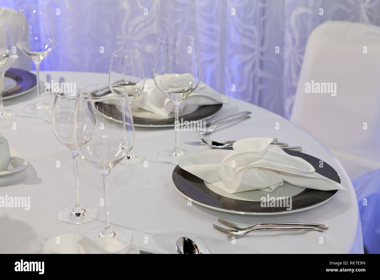Table set for an event party or wedding reception, luxury elegant table setting dinner Stock Photo