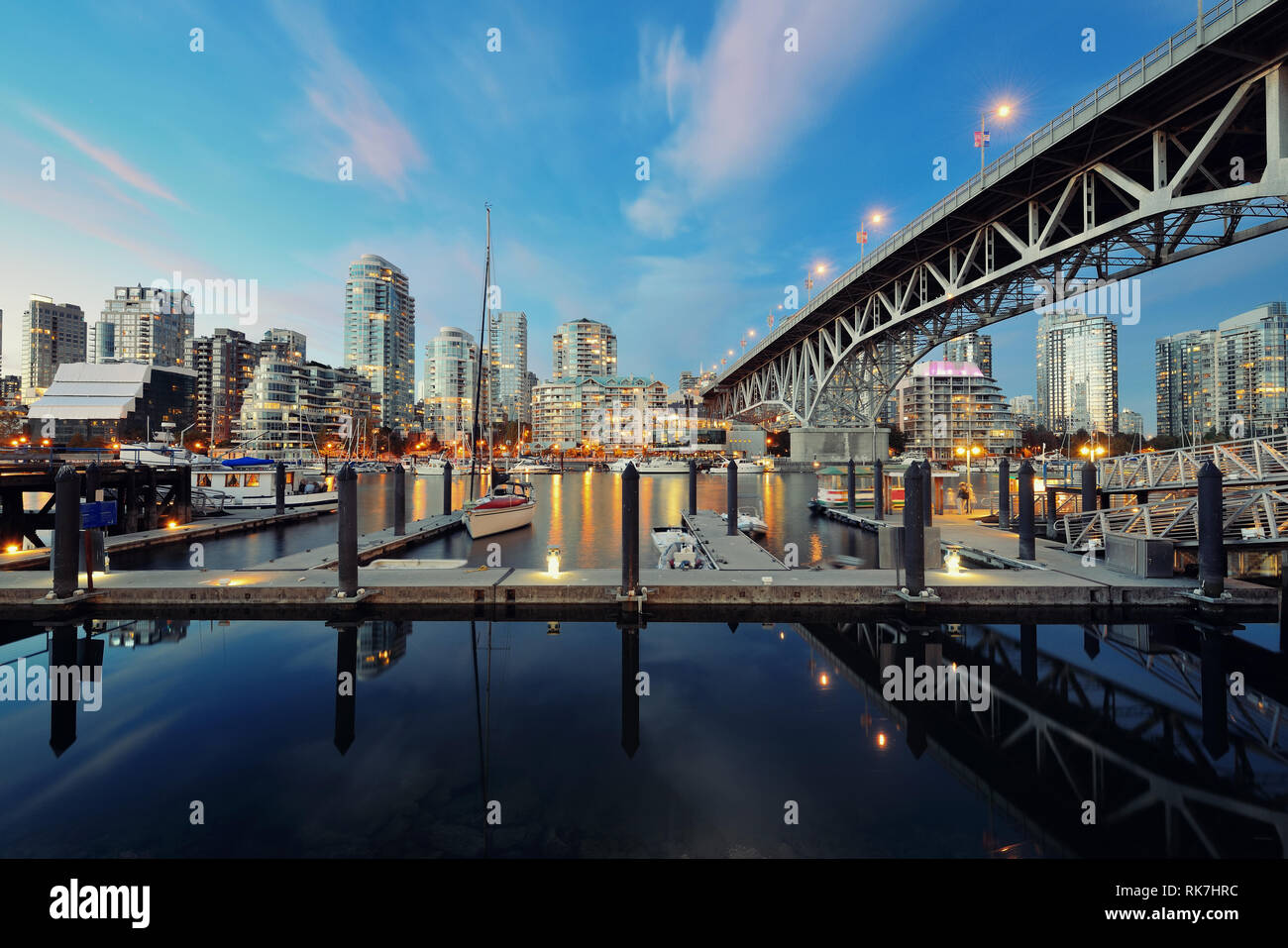 Vancouver False Creek at night with bridge and boat Stock Photo - Alamy
