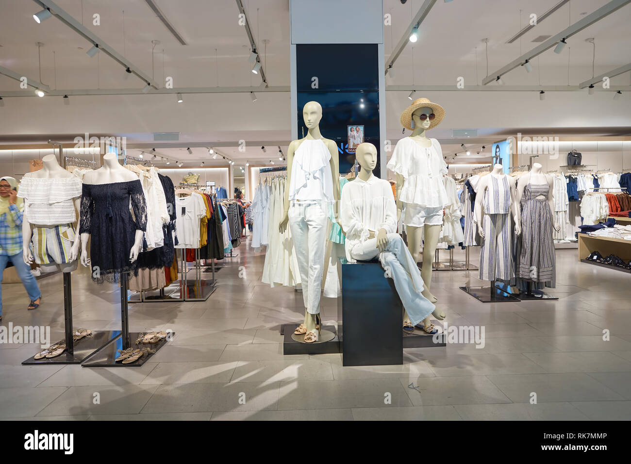 KUALA LUMPUR, MALAYSIA - MAY 09, 2016: interior of MANGO store in Suria KLCC.  Punto Fa, S.L., trading as MANGO, is a clothing design and manufacturing  Stock Photo - Alamy