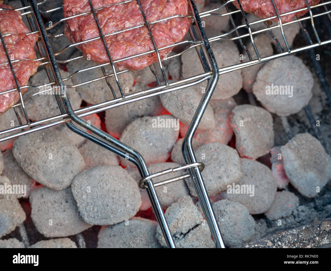 Image of bbq burger patties on grill Stock Photo