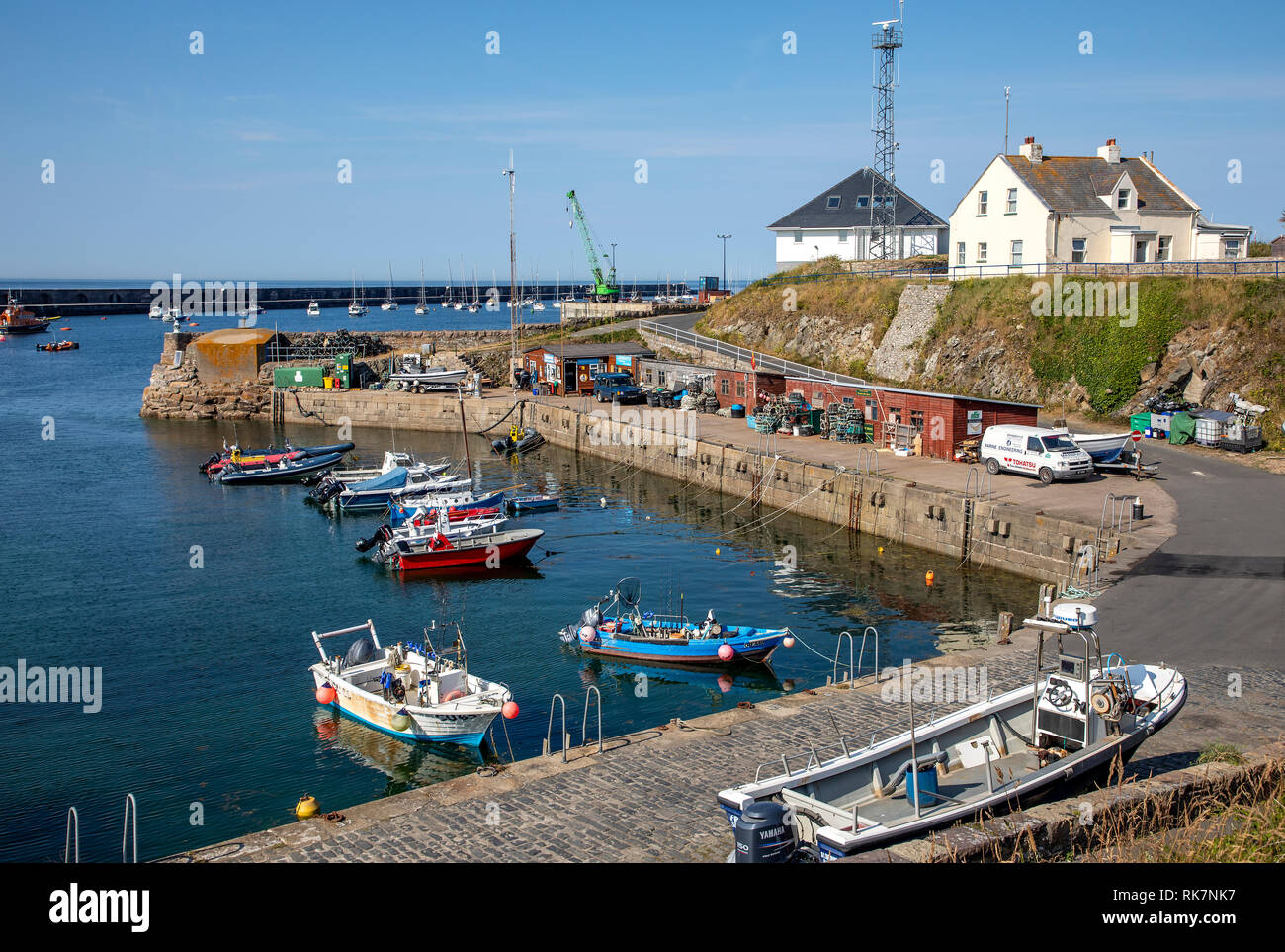 A sunny day view of Braye Harbour on Alderney Channel Islands. Stock Photo