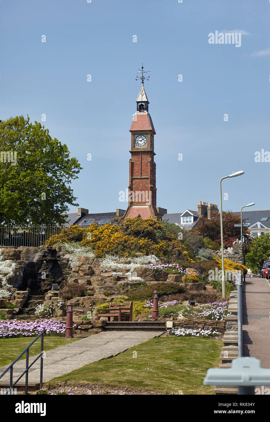 The Jubilee Clock Tower standing at the top of Sea Hill in the Seafield Gardens Seaton. It was built to commemorate Queen Victoria’s Golden Jubilee. D Stock Photo