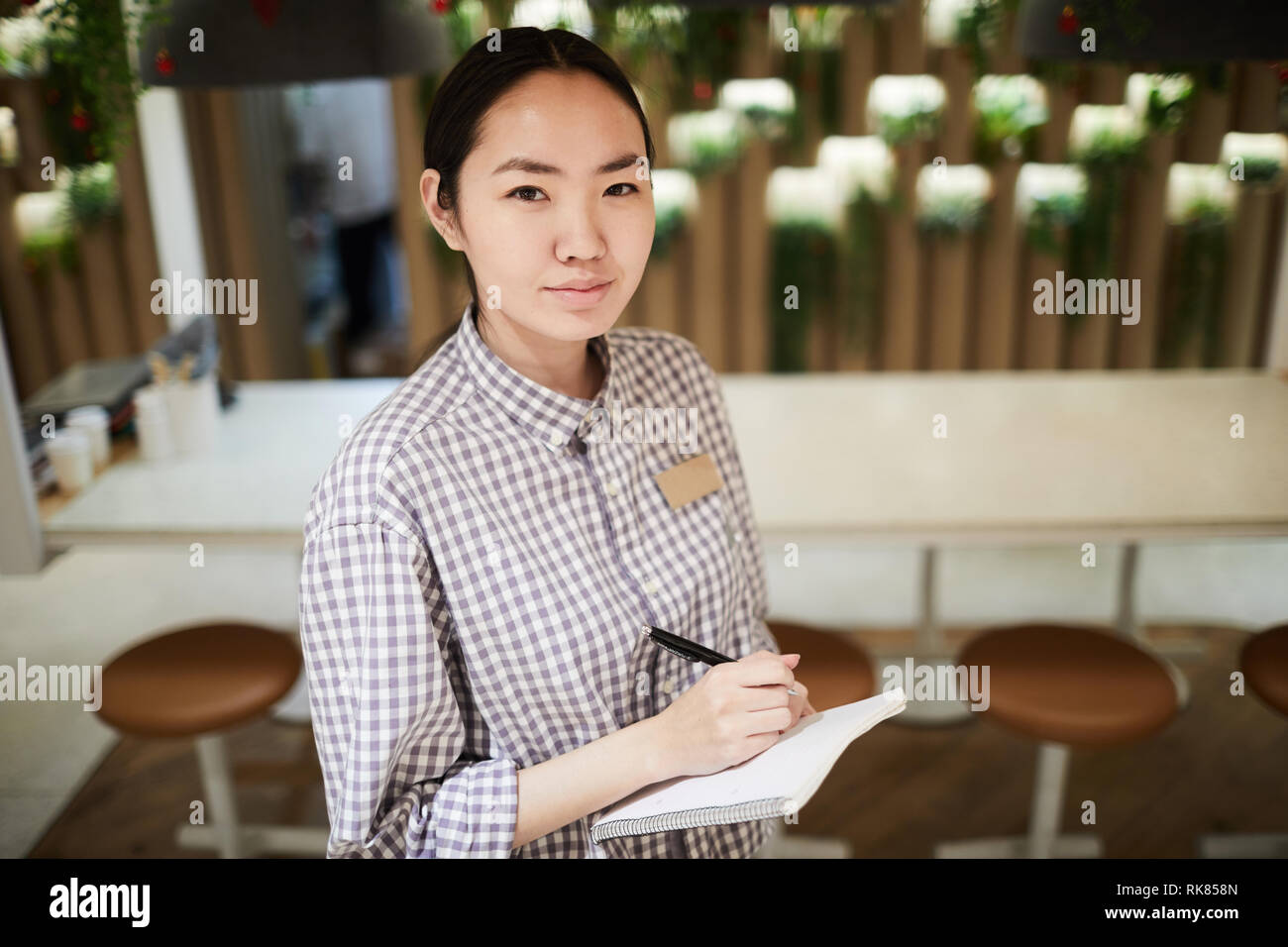 Waitress at work Stock Photo