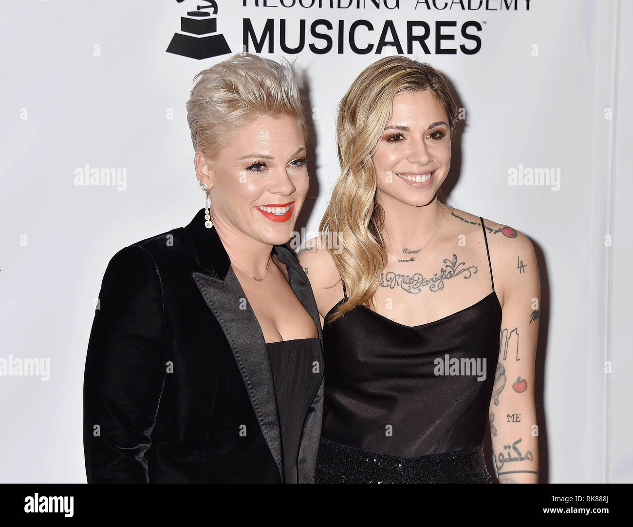 LOS ANGELES, CA - FEBRUARY 08: Pink, Christina Perri attends MusiCares