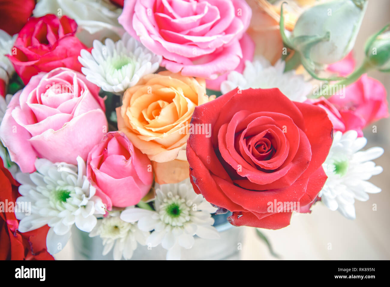 Vase Of Bouquet Roses In Aluminium Bucket On Wooden Table Set Of