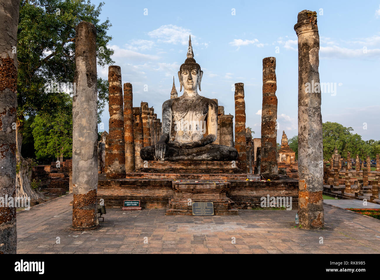 Buddha Statue in the morning at wat mahathat in Sukhothai Historical Park, Thailand Stock Photo