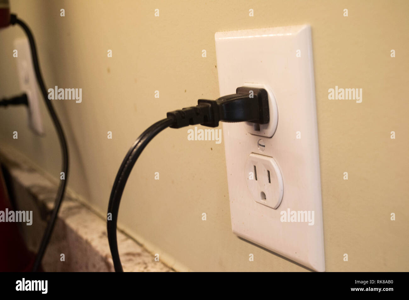 Appliances are plugged into kitchen outlets Stock Photo Alamy