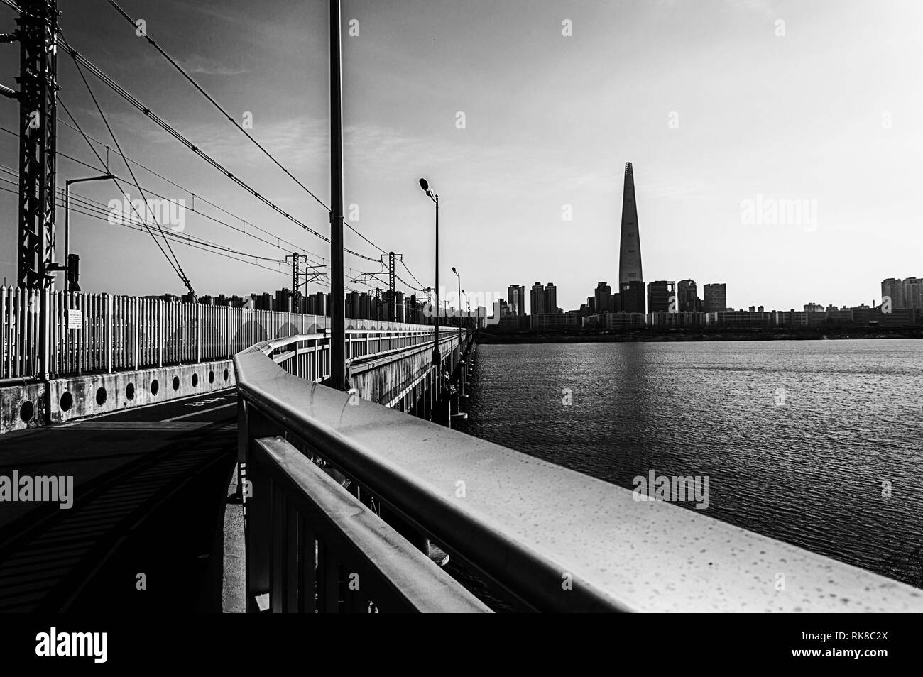 Black and white picture of Jamsil Railway Bridge Walkway in Seoul taken near Gangbyeon Station. Stock Photo