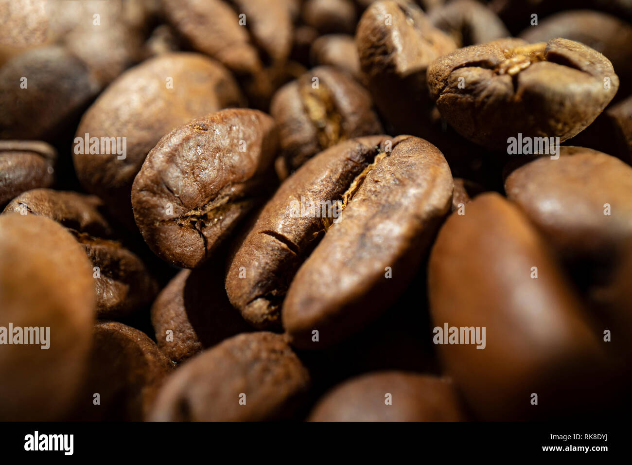 Fragrant fried coffee beans background Stock Photo
