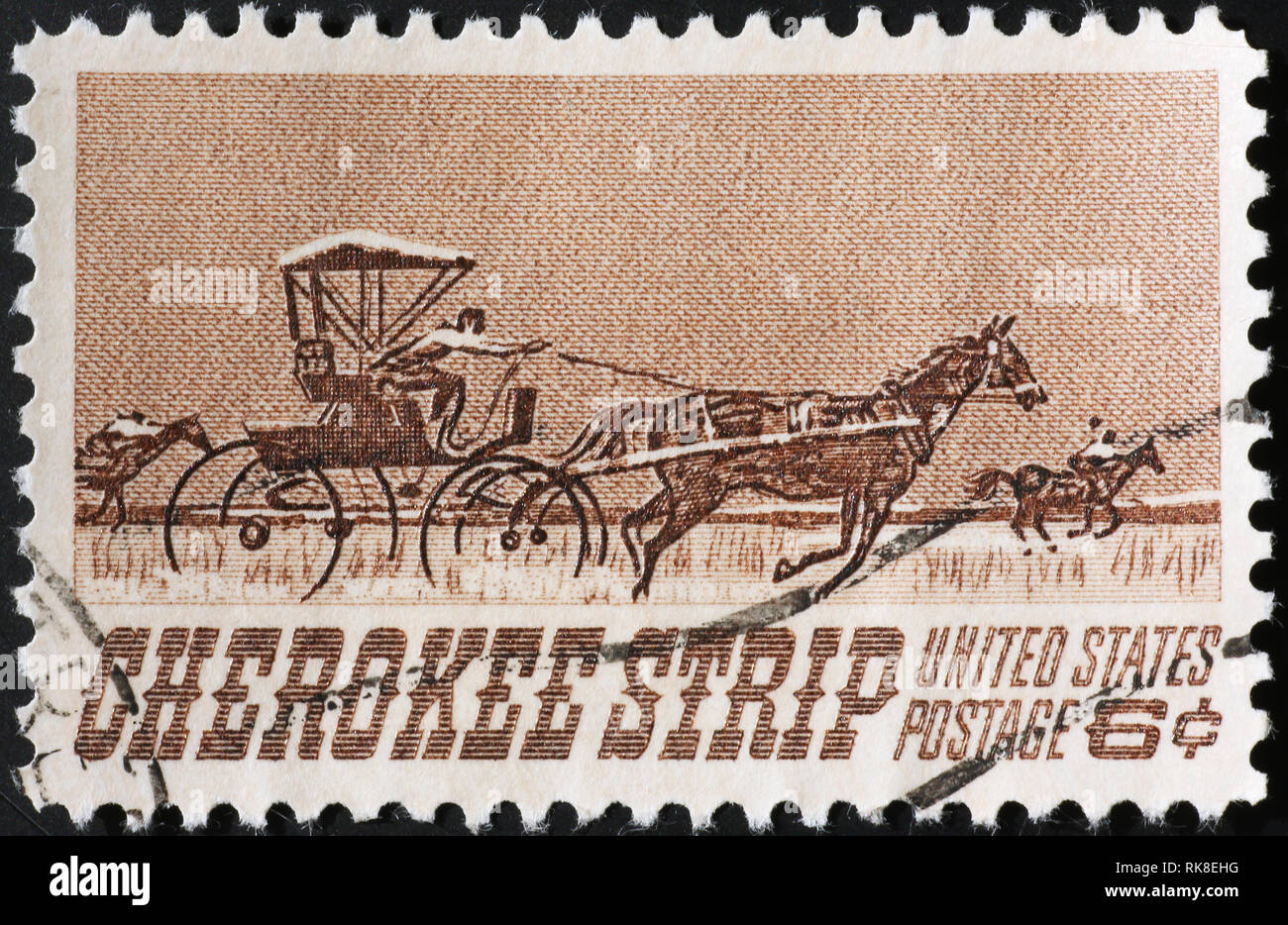 Cherokee strip run on vintage american postage stamp Stock Photo