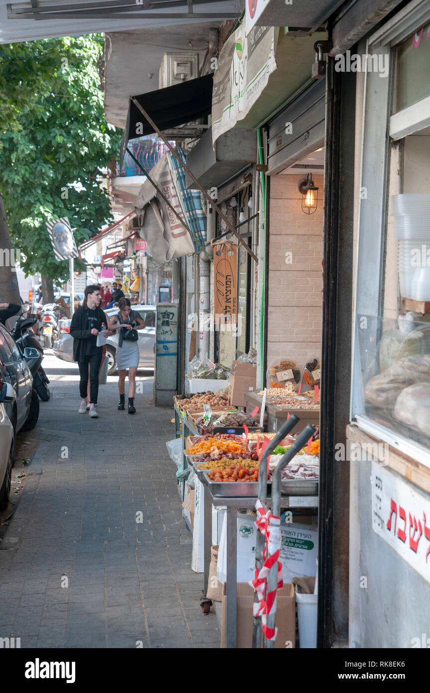 Israel, Tel Aviv, Lewinski market, Spice and herb shop in the narrow street Stock Photo