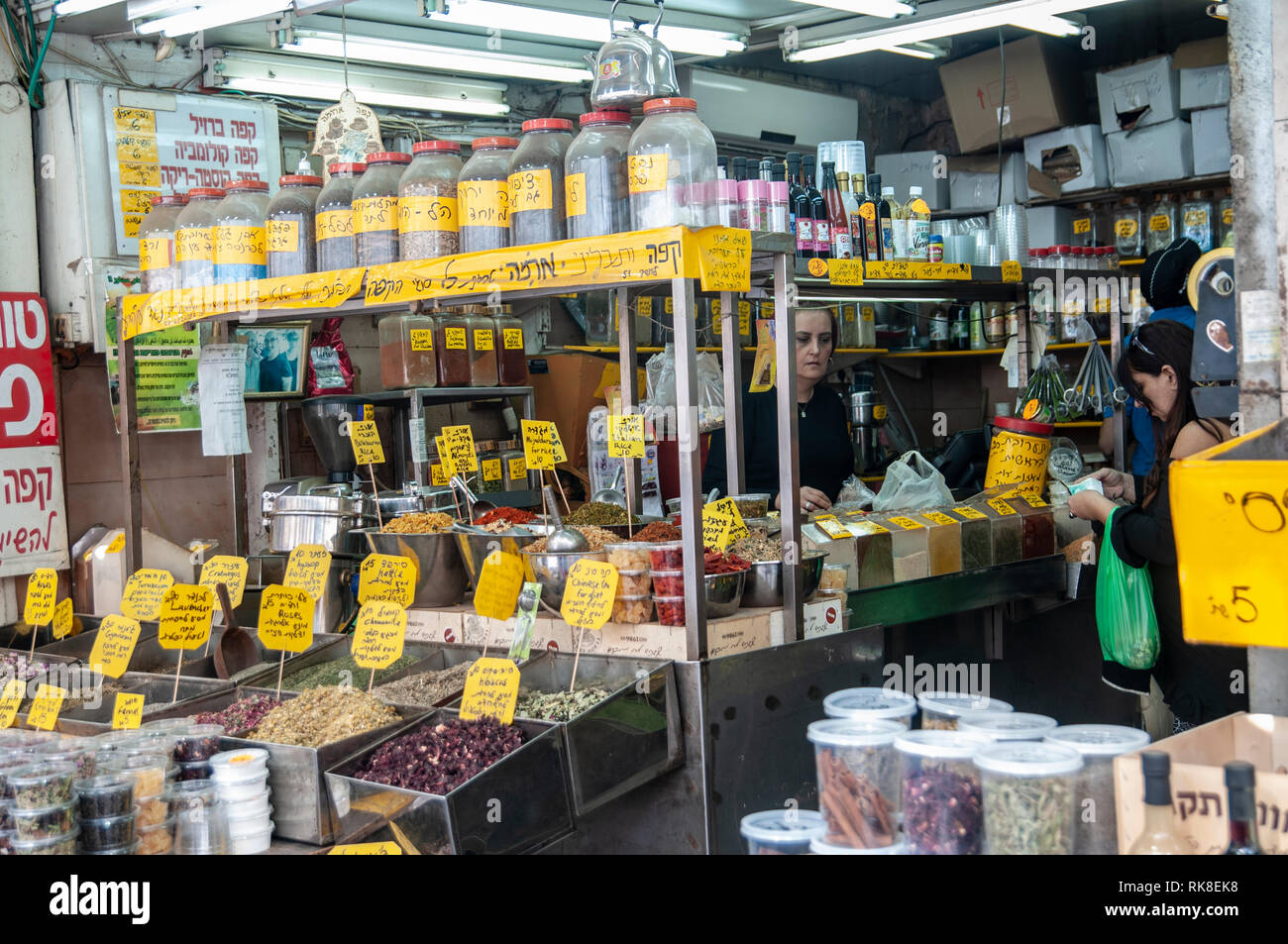 Israel, Tel Aviv, Lewinski market, Spice and herb shop in the narrow