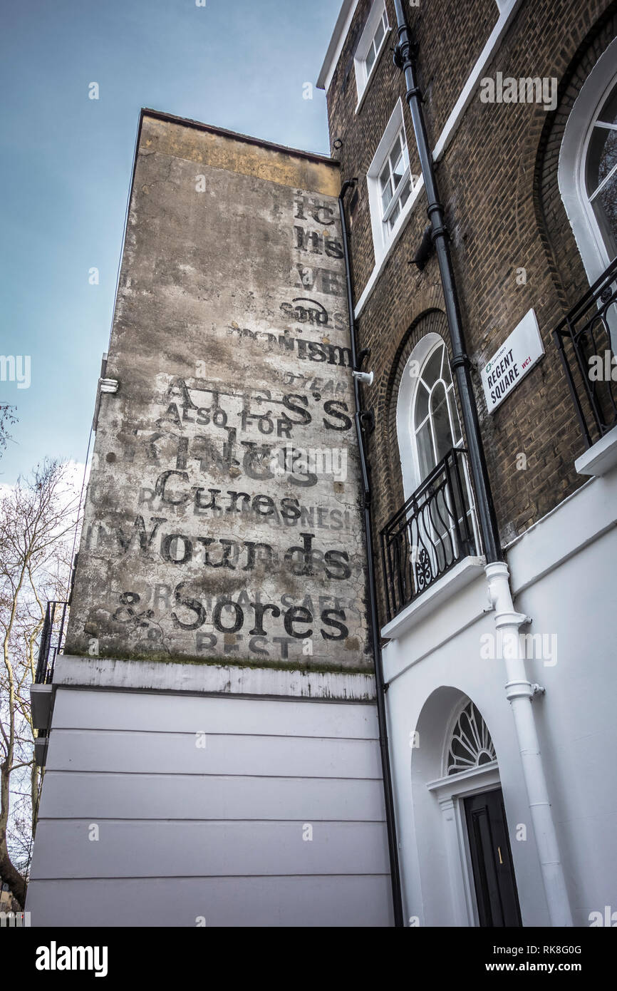 Ghost signs, Regent Square, London, WC1, UK Stock Photo