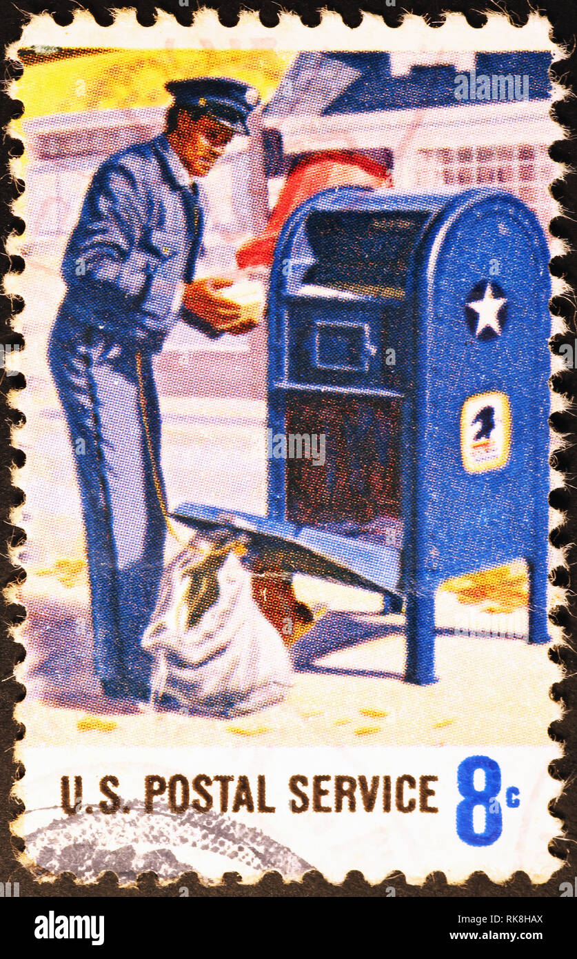 Mailman on american postage stamp Stock Photo