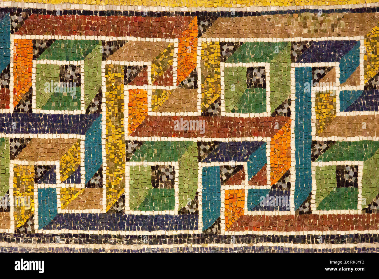 Very colorful byzantine mosaic in Mausoleum of Galla Placidia, Ravenna, Italy. An ancient ornamental mosaic, astonishing for its incredible modernity. Stock Photo