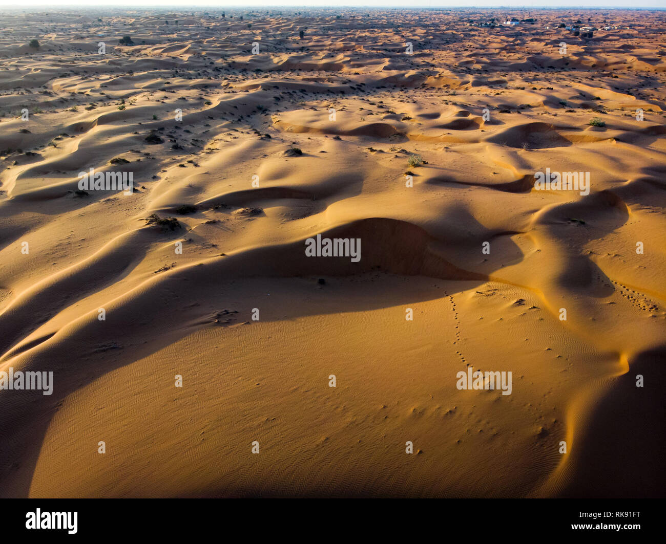 Desert sand dunes and vast space landscape aerial view Stock Photo