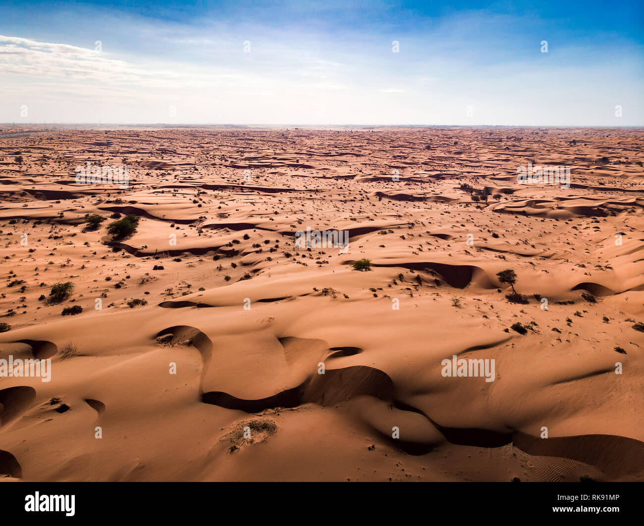 Desert sand dunes and vast space landscape aerial view Stock Photo