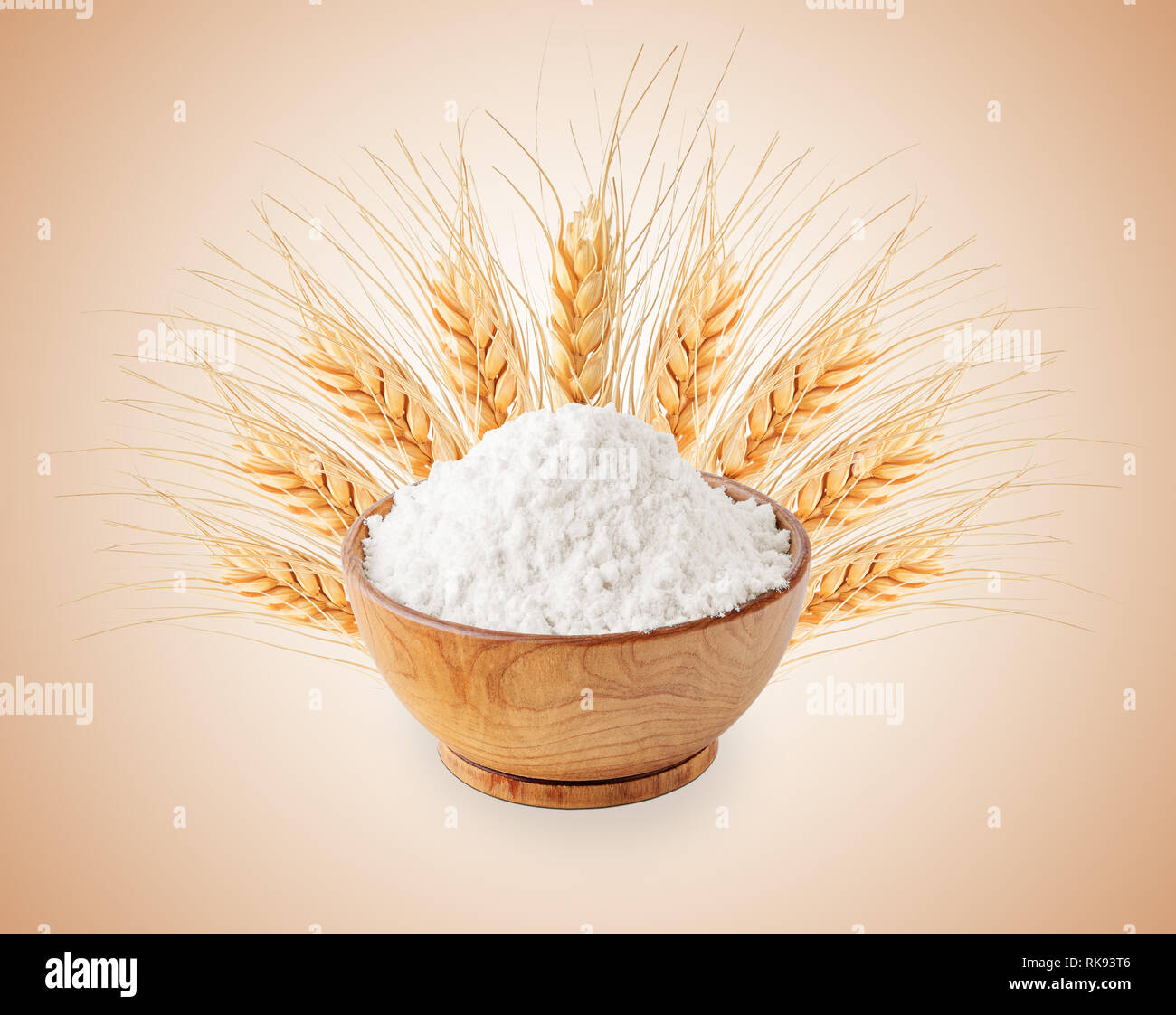 Bowl of white wheat flour and ears isolated Stock Photo