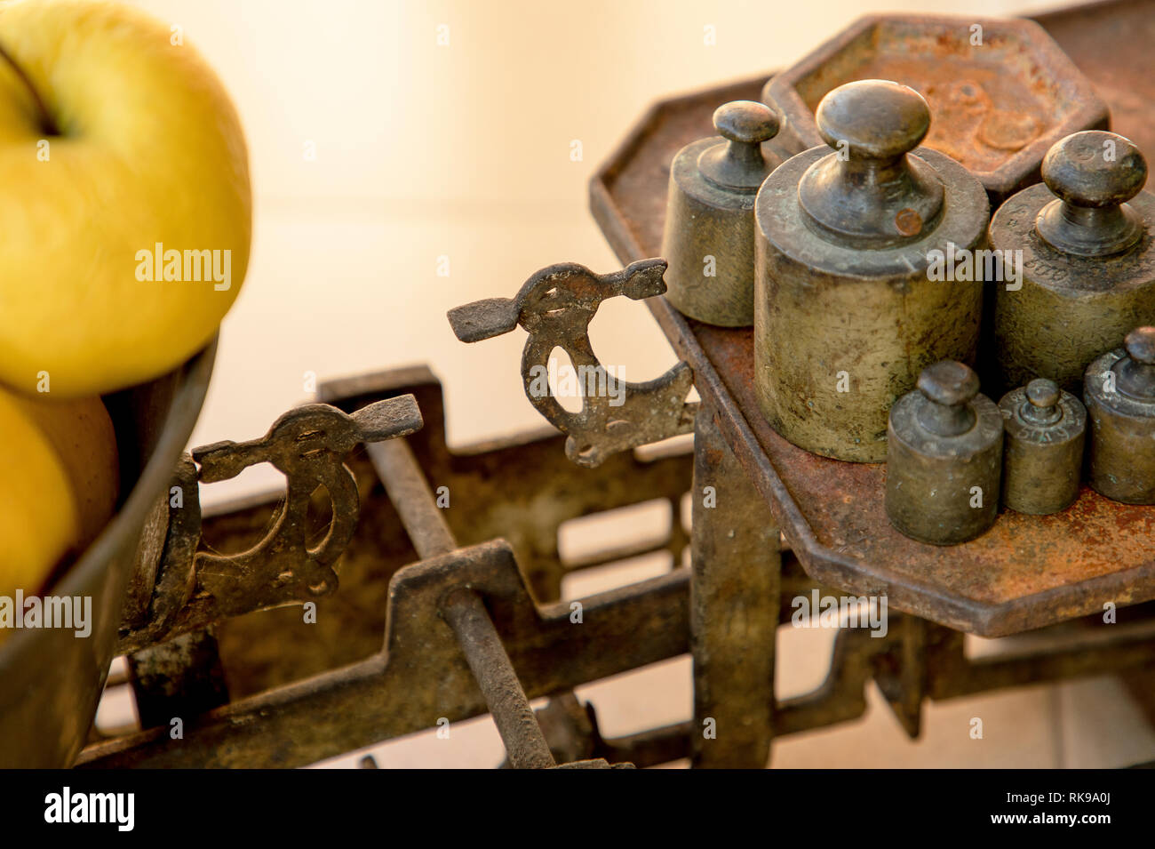 Weights for retro scales. Vintage weight for a balance scale, Balance weights. Stock Photo
