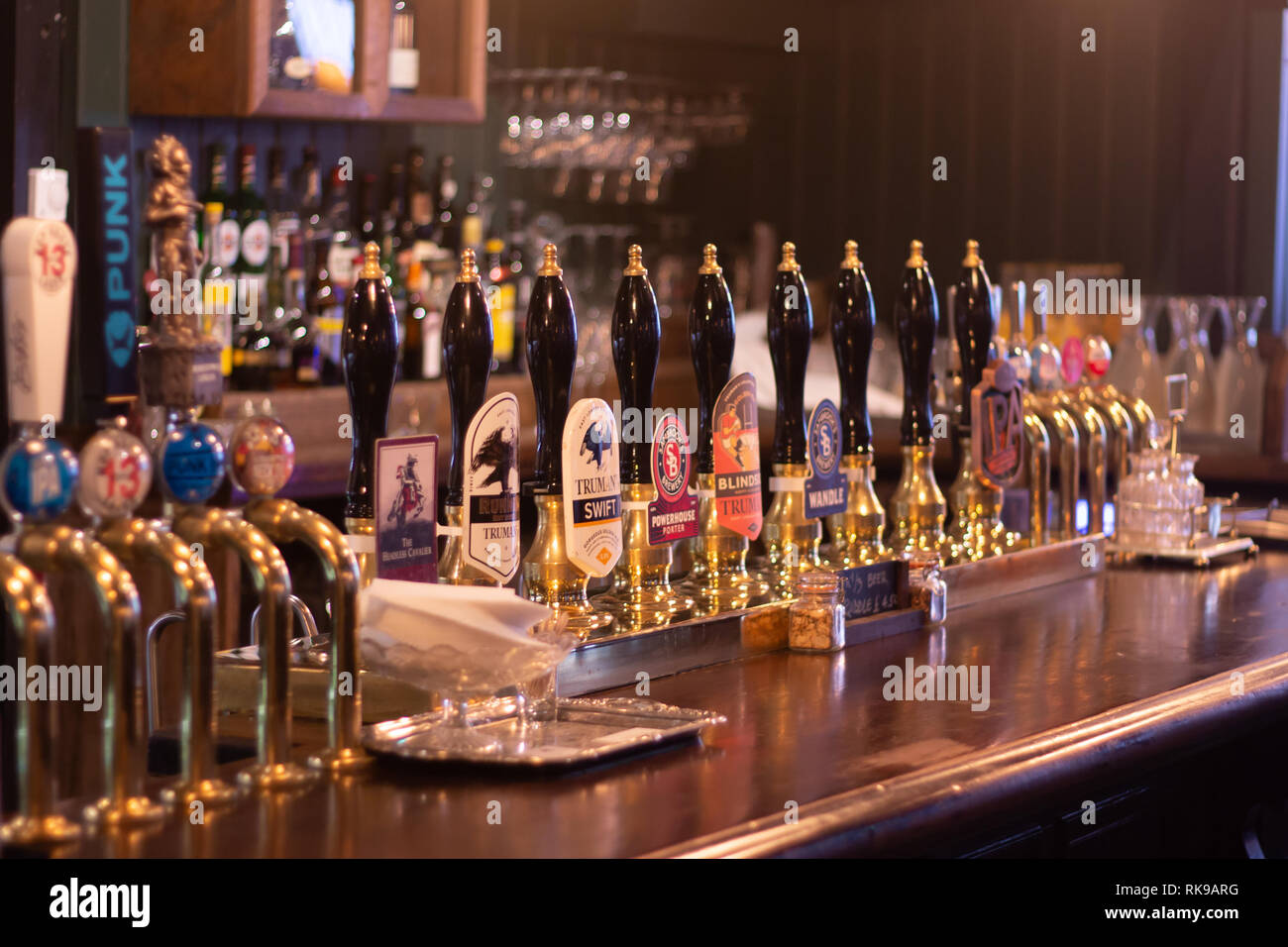 Beers on tap in a traditional english pub in London Stock Photo