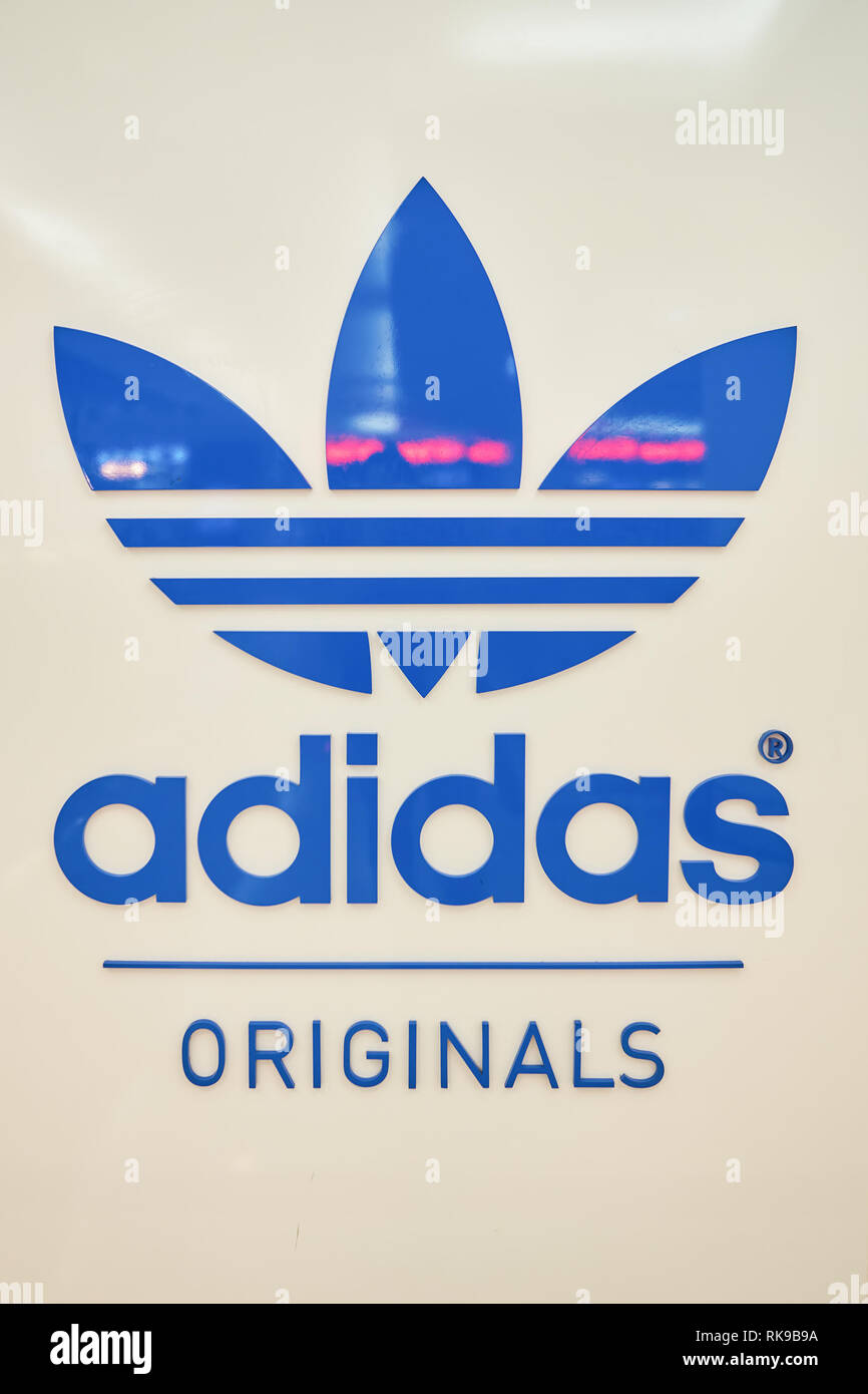 KUALA LUMPUR, MALAYSIA - MAY 09, 2016: close up shot of logo in Adidas  store in Suria KLCC. Suria KLCC is a shopping mall is located in the Kuala  Lump Stock Photo - Alamy