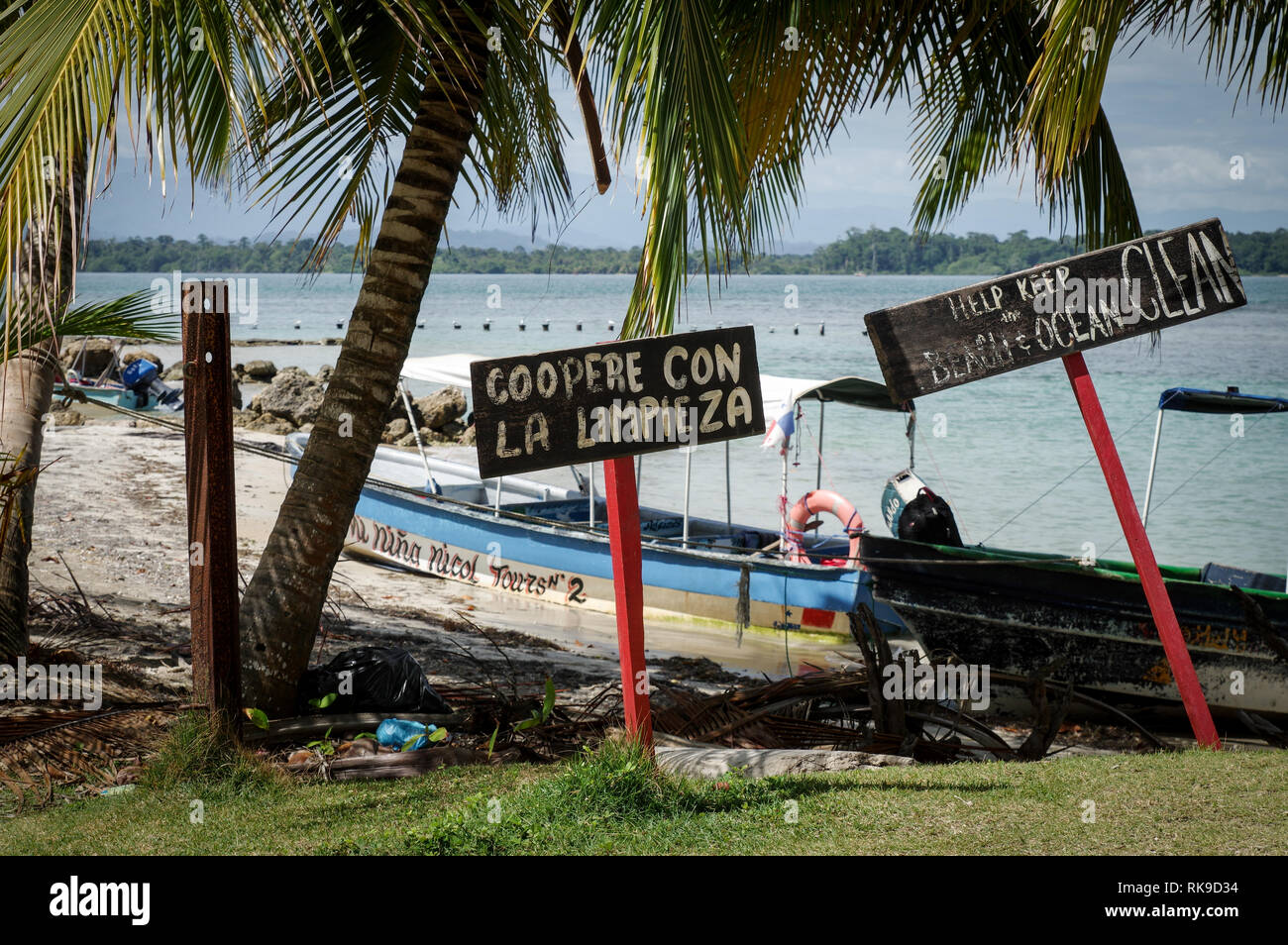 Homemade environmental awareness signs in Playa Boca Del Drago on Isla Colon - Bocas Del Toro Archipelago, Panama Stock Photo