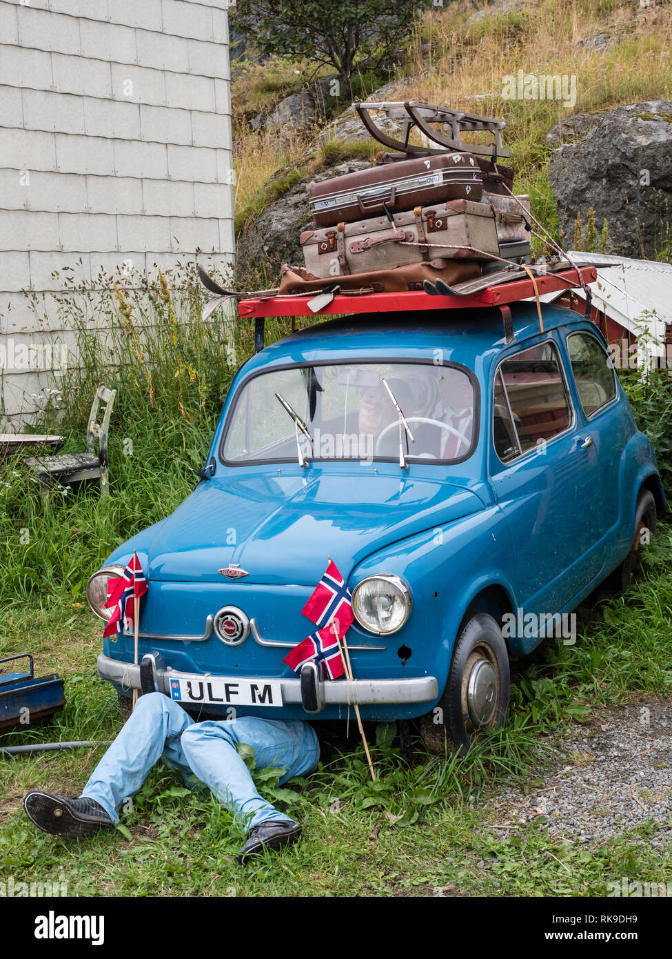 Art object,  Ulf M car installation, village Stamsund, Lofoten, Norway Stock Photo
