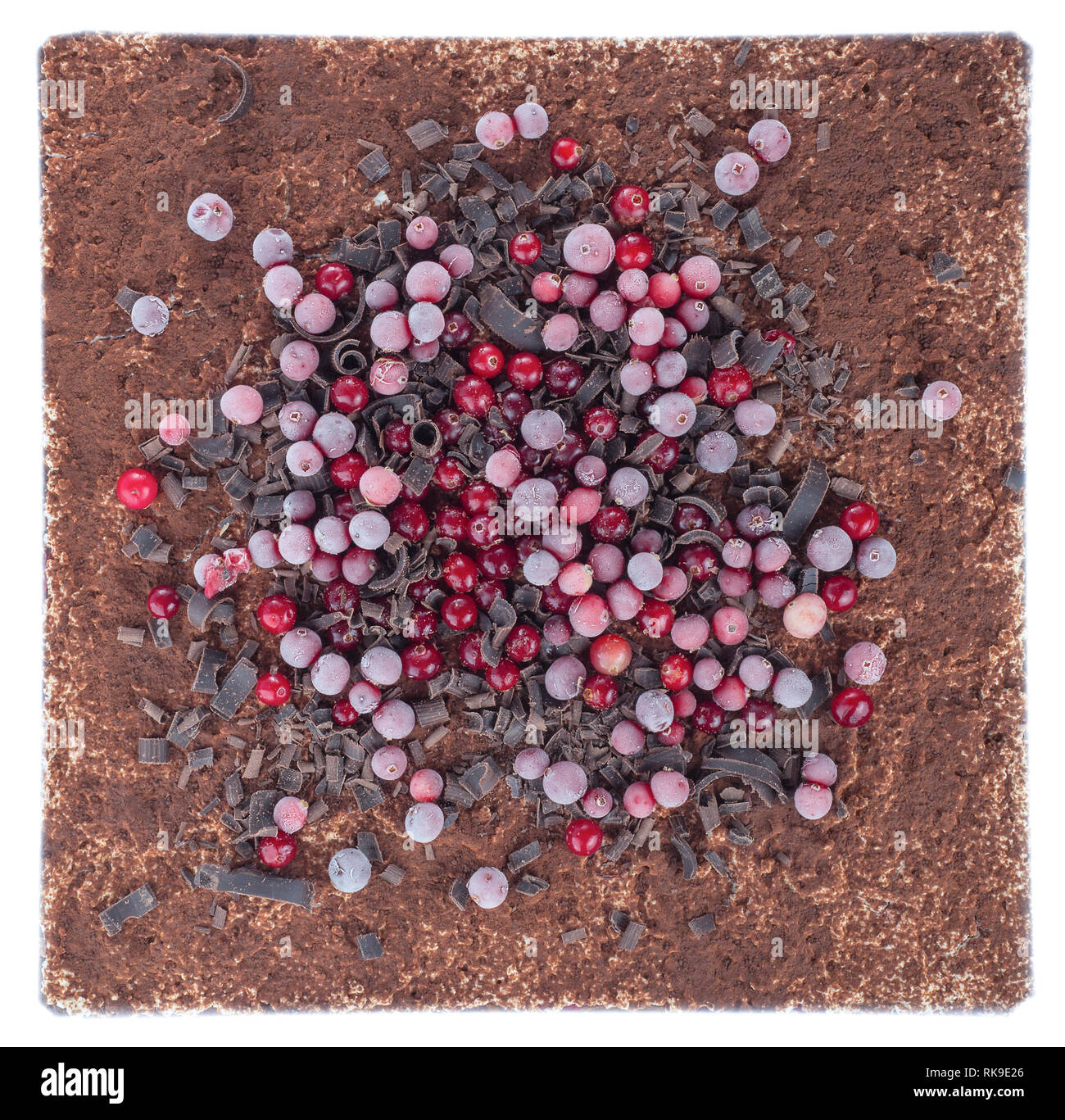 Chocolate cake with berry filling and berry decorations in the festive decor. concept holiday home baking top view Stock Photo