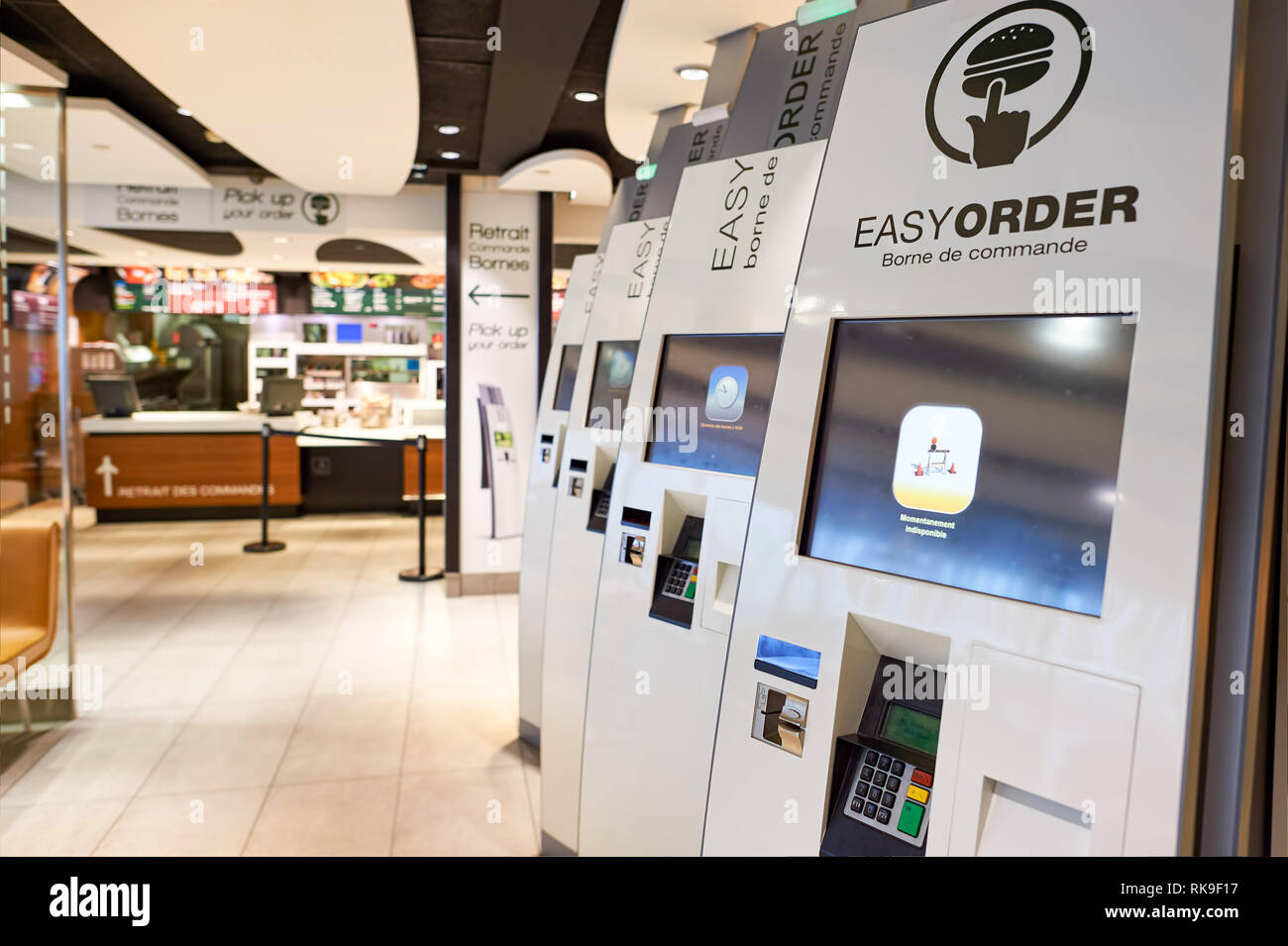 PARIS - AUGUST 08, 2015: interior of McDonald's restaurant at Orly Airport. McDonald's is the world's largest chain of hamburger fast food restaurants Stock Photo