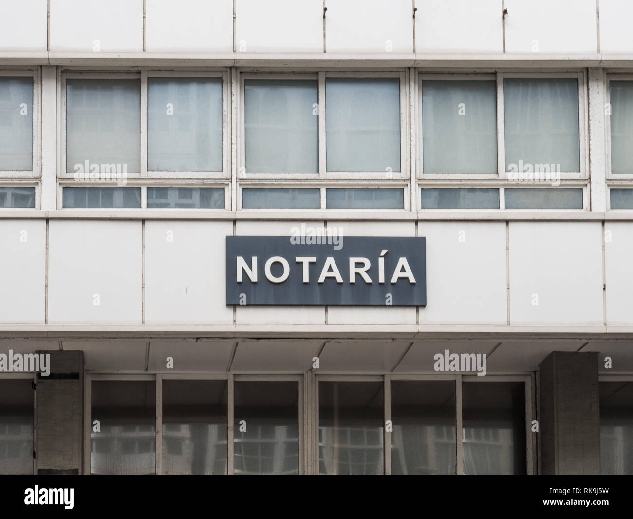 Signboard with the word notary in Spanish Stock Photo Alamy