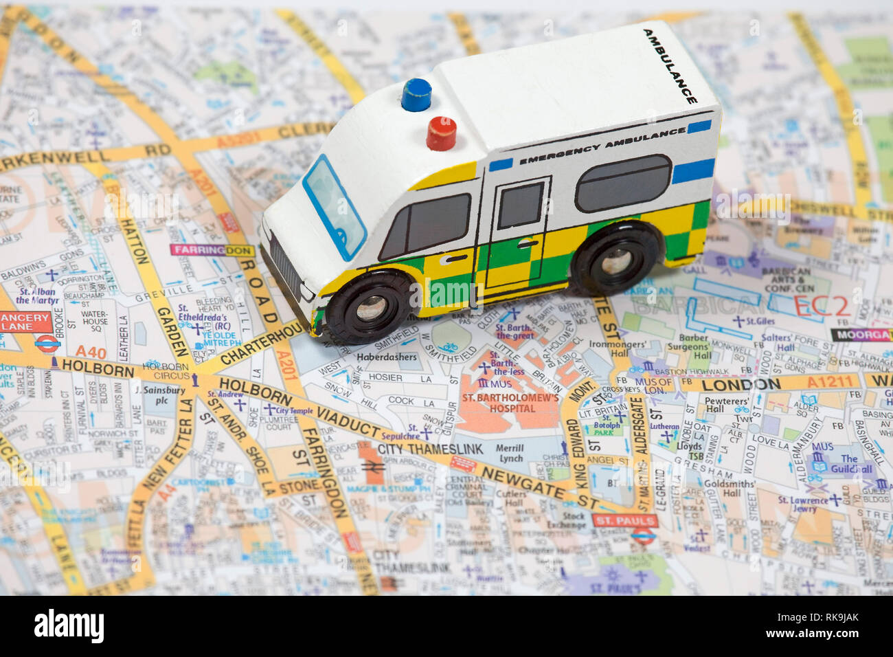Toy Ambulance on map of London uk Stock Photo