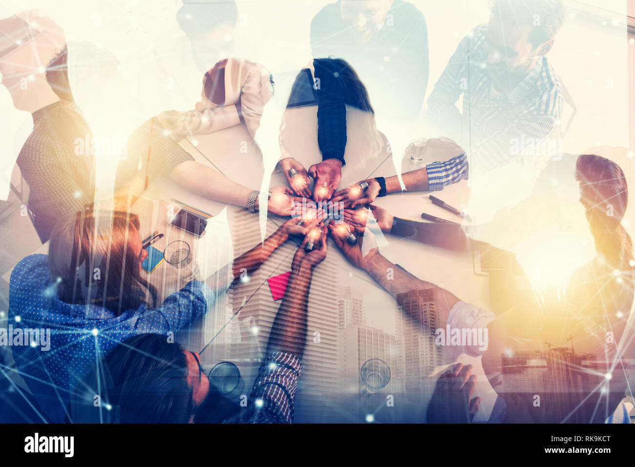 Teamwork and brainstorming concept with businessmen that share an idea with a lamp. Concept of startup. Double exposure Stock Photo