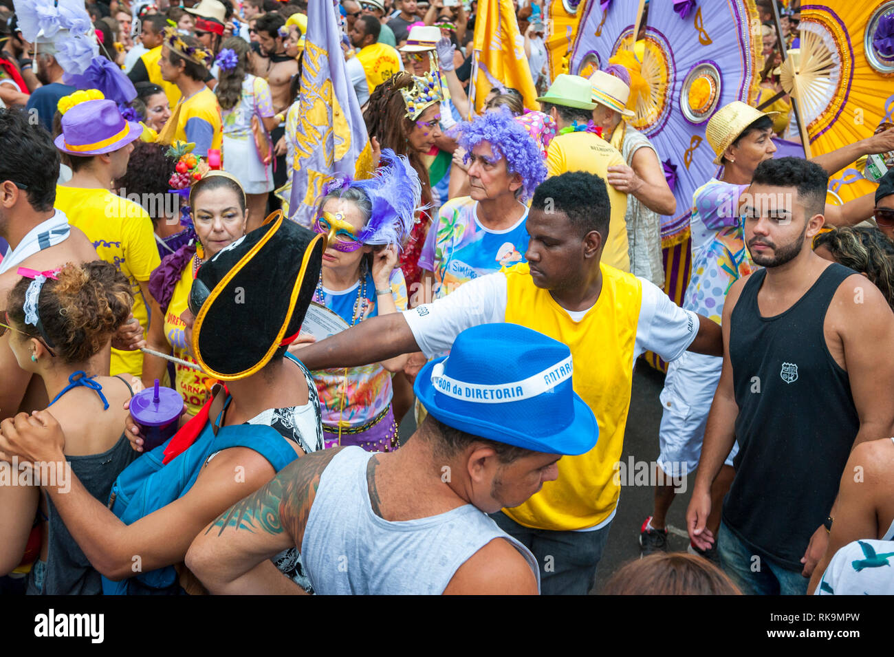 RIO DE JANEIRO - FEBRUARY 28, 2017: Brazilians of all ages jostle for space at Simpatia e Quase Amor (Sympathy is Almost Love) Carnival street party. Stock Photo