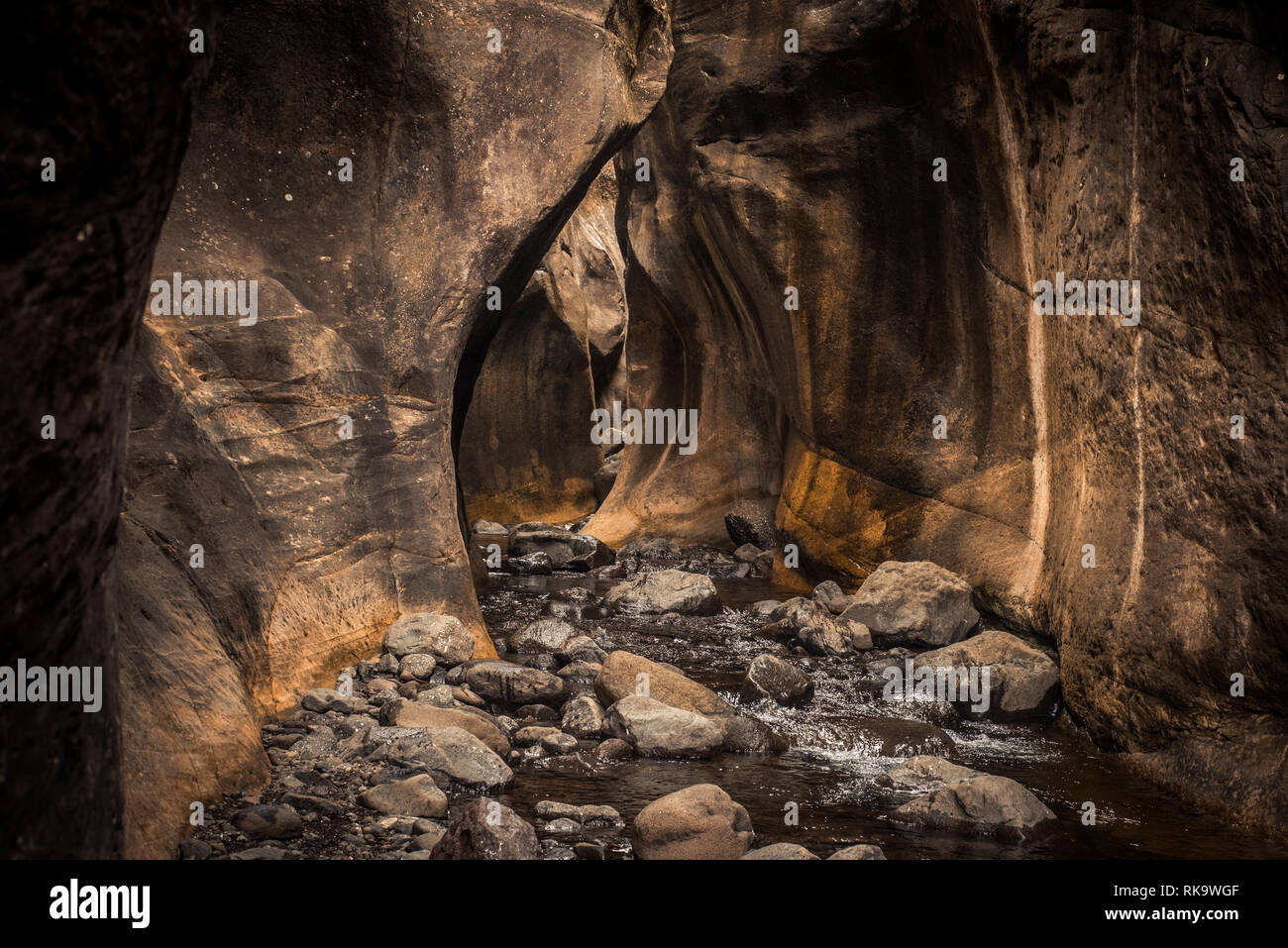 An eroded cave/tavern carved out by a stream in the Tugela Gorge hike ...