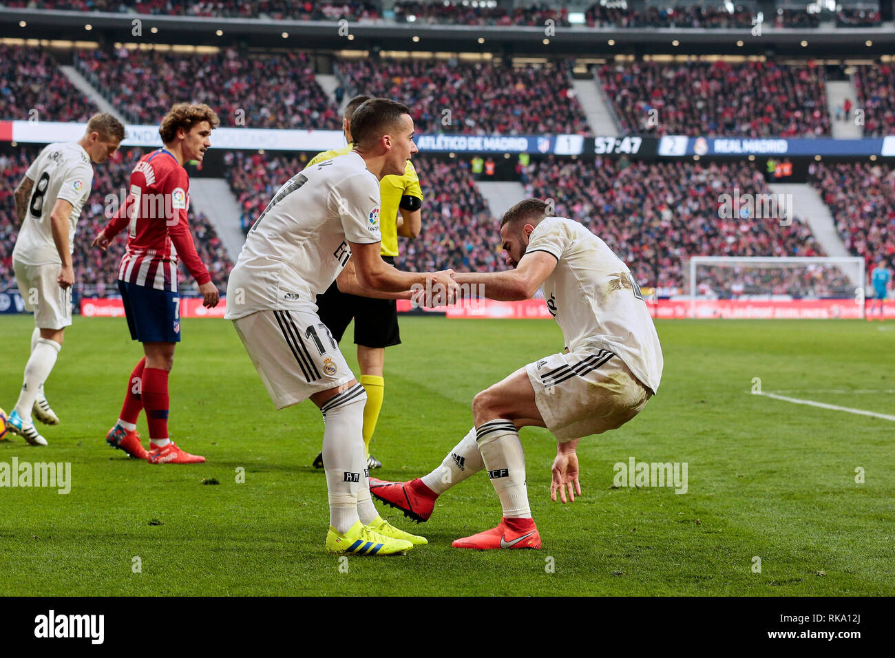 Madrid, Spain. 9th Feb 2019. Real Madrid's Dani Carvajal (L) and Lucas Vazquez (R) are seen in action during the La Liga match between Atletico de Madrid and Real Madrid at Wanda Metropolitano Stadium in Madrid, Spain. ( Final score: Atletico de Madrid 1:3 Real Madrid ) Credit: SOPA Images Limited/Alamy Live News Stock Photo