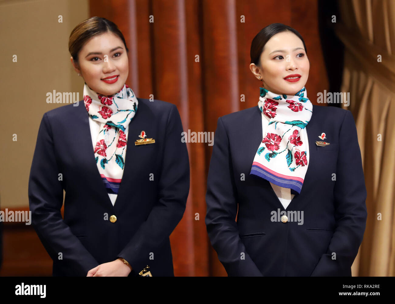 Tokyo, Japan. 8th Feb, 2019. Cabin attendants of Philippine Airlines (PAL) smile as PAL and All Nippon Airways (ANA) expand their partnerships in Tokyo on Friday, February 8, 2019. ANA Holdings will invest 95 million U.S. dollars to PAL Holdings and acquire 9.5 percent of PAL Holdings shares. Credit: Yoshio Tsunoda/AFLO/Alamy Live News Stock Photo