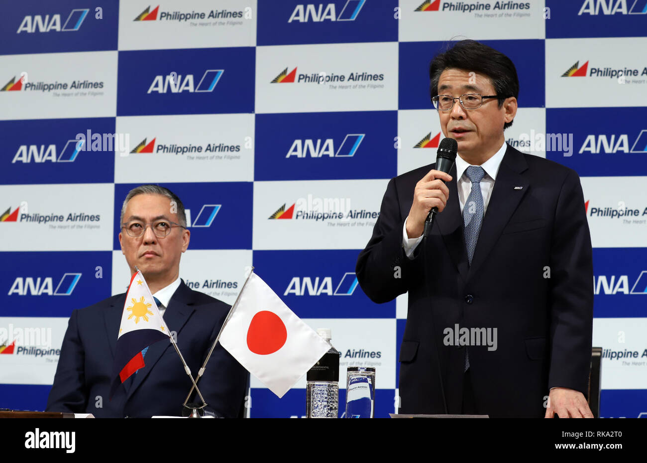 Tokyo, Japan. 8th Feb, 2019. ANA Holdings president Shinya Katanozaka (R) speaks while LT Group president and PAL Holdings director Michael Tan (L) looks on as they announce the companies expand their partnerships in Tokyo on Friday, February 8, 2019. ANA Holdings will invest 95 million U.S. dollars to PAL Holdings and acquire 9.5 percent of PAL Holdings shares. Credit: Yoshio Tsunoda/AFLO/Alamy Live News Stock Photo
