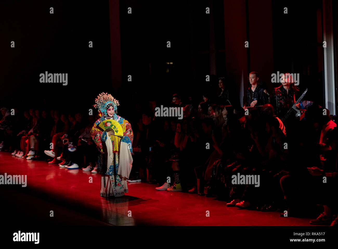 New York, USA. 9th Feb, 2019. An artist performs at the 'PONY X HARBIN' show during the New York Fashion Week in New York, the United States, Feb. 9, 2019. Popular Chinese brand Harbin Beer on Saturday put on an experimental show that blended traditional Chinese culture and American street art at the ongoing New York fashion week. The show started with a short music piece that was a fusion of Peking Opera and R&B, followed by a catwalk show debuting collection jointly presented by Harbin Beer and American sports brand PONY. Credit: Wang Ying/Xinhua/Alamy Live News Stock Photo