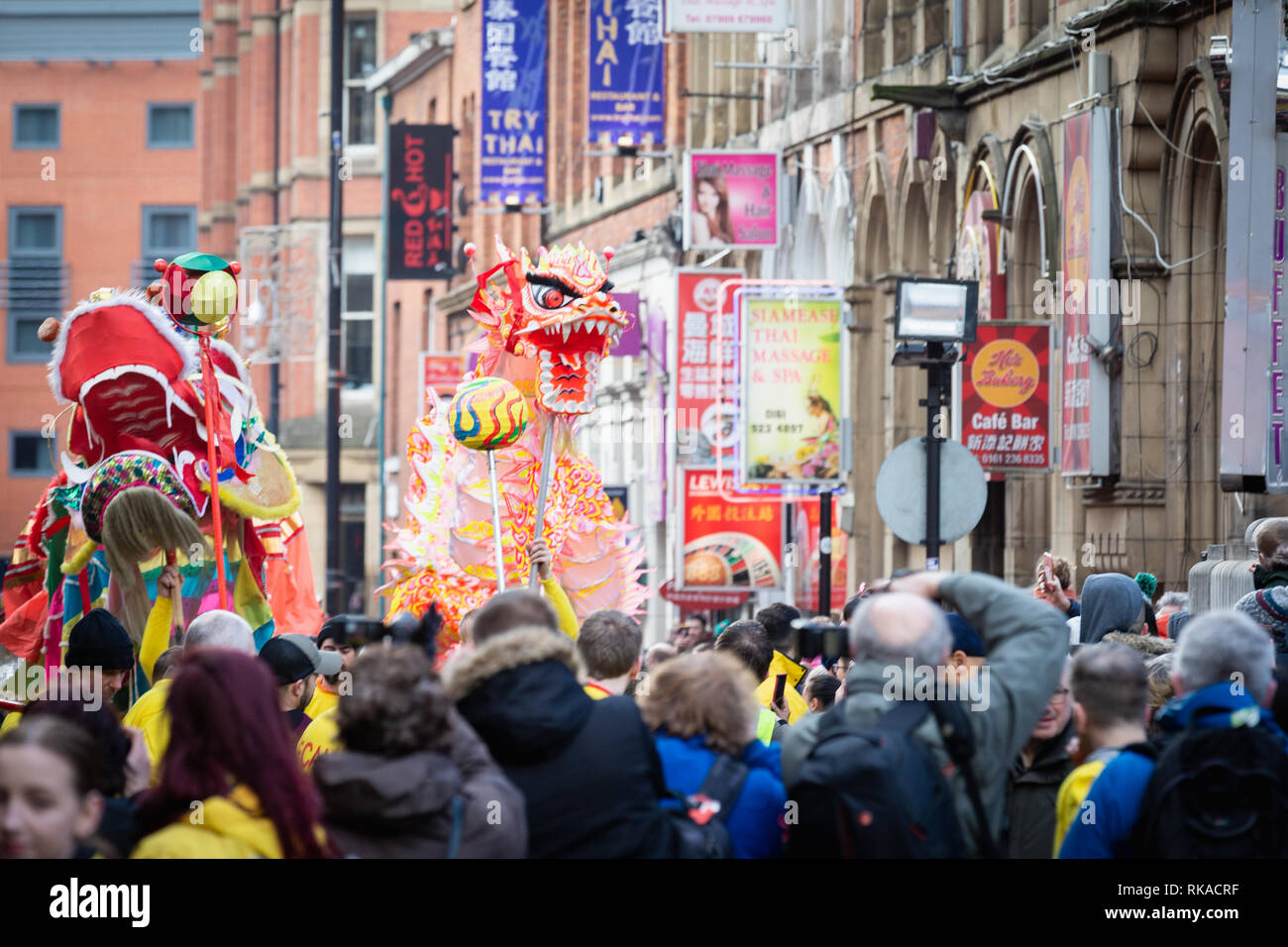 Manchester, UK. 10th Feb 2019. Thousands of spectators lined the streets during this year dragon parade which weaved through the streets of China Town to celebrate the year of the pig. Credit: Andy Barton/Alamy Live News Stock Photo
