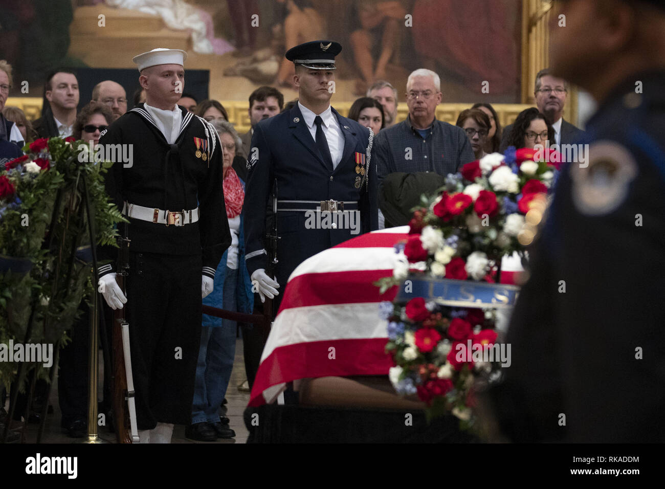 Washington, District of Columbia, USA. 4th Dec, 2018. Mourners view the
