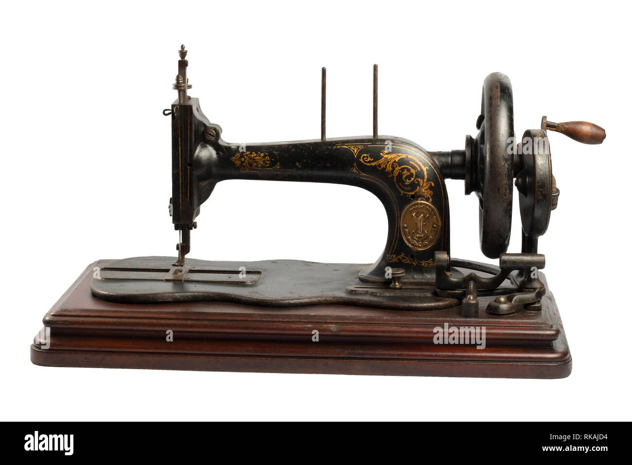 vintage sewing machine isolated on white background Stock Photo - Alamy